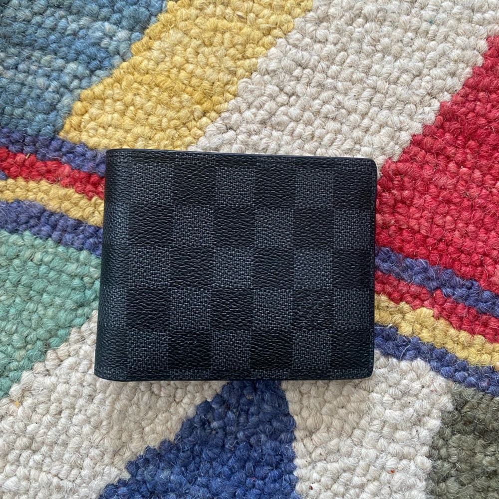 Louis Vuitton black wallet.